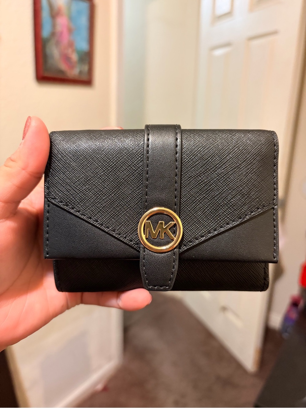 Michael Kors Black Saffiano Trifold Wallet with Gold MK Emblem